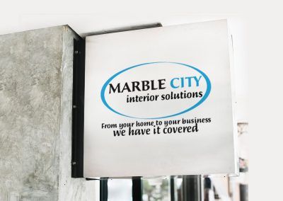 BEHANCE marble city front sign